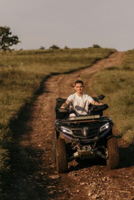 A person riding an ATV bike