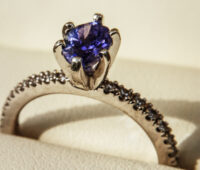 ring with blue precious stone
