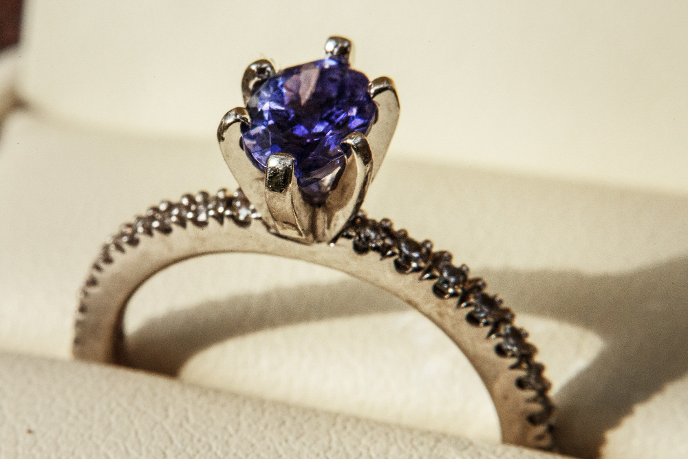 ring with blue precious stone