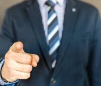 Man Wearing A Suit Jacket And Stripe Necktie