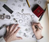 Jewelry Designer Designs Jewelries on Paper