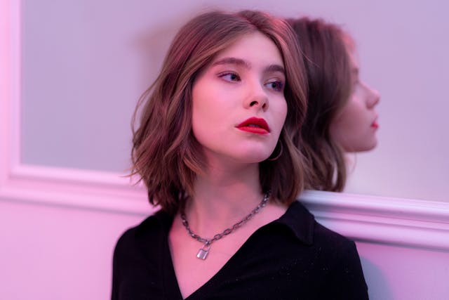 A Woman Wearing a Chain Necklace