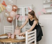 Woman Preparing for a Birthday Celebration