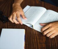 man enjoying reading book