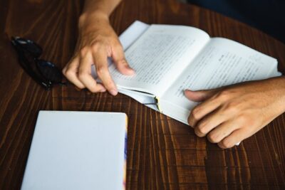 man enjoying reading book