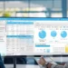 A man and woman in business attire analyze a computer screen displaying the SalesForce opportunity tool.