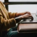 A person doing work on a laptop