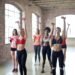 Women Having Exercise Using Dumbbells