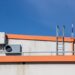 Industrial Rooftop with HVAC Unit and Ladder