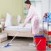 housekeeper is cleaning the house