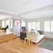 White Couch Near Black Mat